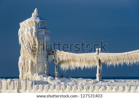 Ice accumulates on the St. Joseph North Pier Lighthouse in Saint Joseph, Michigan