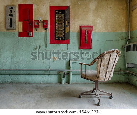 BOISE, IDAHO - JULY 31: Empty chair in front of a fuse box at the Old Idaho State Penitentiary on July 31, 2013 in Boise, Idaho