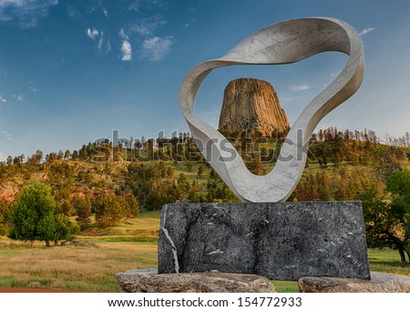 DEVILS TOWER, WYOMING - JULY 27: The Circle of Sacred Smoke frames Devils Tower on July 27, 2013 in Devils Tower, Wyoming