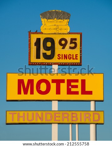 GALLUP, NEW MEXICO - AUGUST 8: Thunderbird Motel sign on W. Historic Highway 66 on August 7, 2014 in Gallup, New Mexico