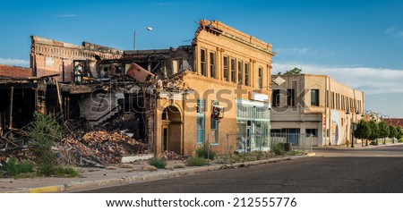 TUCUMCARI, NEW MEXICO - AUGUST 9: Abandoned buildings downtown on August 9, 2014 in Tucumcari, New Mexico