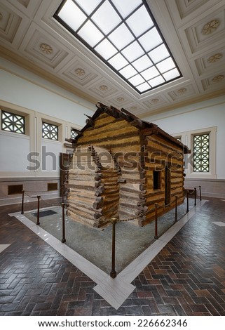 HODGENVILLE, KENTUCKY - OCT 21: Log cabin inside the first Lincoln Memorial building at Abraham Lincoln Birthplace National Historical Park on October 21, 2014 in Hodgenville, Kentucky