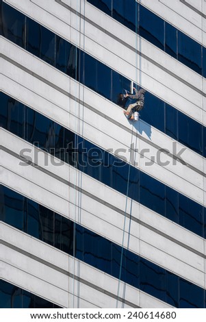 COLUMBIA, SOUTH CAROLINA - DECEMBER 10: High rise window washer at the Capitol Center on December 10, 2014 in Columbia, South Carolina