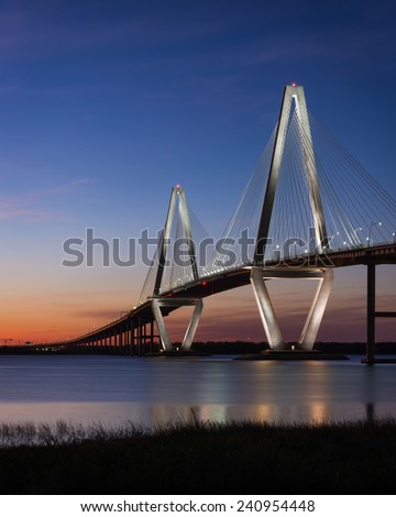 CHARLESTON, SOUTH CAROLINA - DECEMBER 7: Sunset at the Arthur Ravenel Jr. Bridge across the Cooper River on December 7, 2014 in Charleston, South Carolina