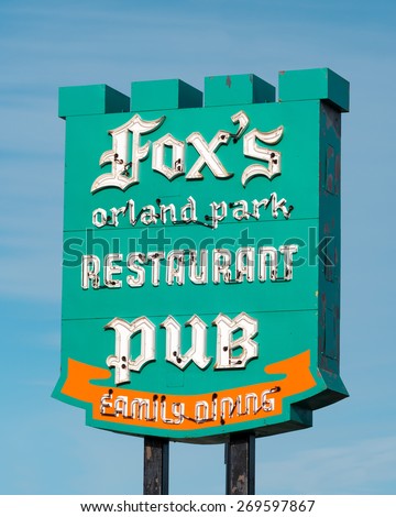 ORLAND PARK, ILLINOIS - APRIL 13: Colorful sign of the Fox\'s Restaurant Pub on April 13, 2015 in Orland Park, Illinois