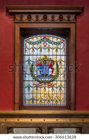 TRENTON, NEW JERSEY - JULY 22: Stained glass window of the state seal in the New Jersey State House rotunda on July 22, 2015 in Trenton, New Jersey