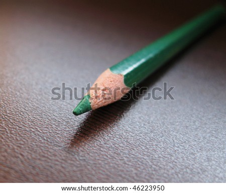 green pencil-pointer