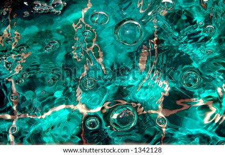 green water with bubbles waves and ripples