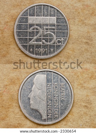 From series: coins of world. Nederlanden. On background old book. Twenty five cent. Diameter of 19 mm.