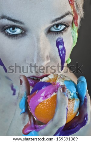 Fashion color Face art model portrait eat orange