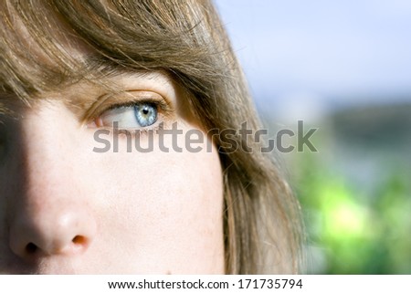 Woman portrait with impressive blue eye