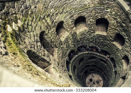 The Initiation well of Quinta da Regaleira  It's a 27 meter staircase that leads straight down underground and connects with other tunnels via underground. located in Sintra, Portugal.