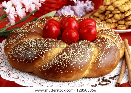 Easter sweet bread with red eggs Easter sweet bread with red eggs