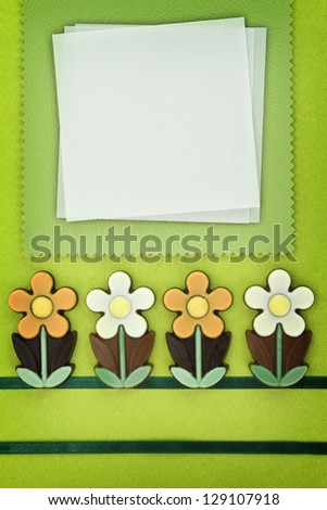 Chocolate flowers and paper greeting card