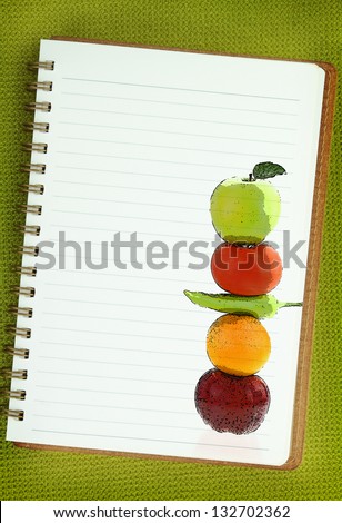 Fruits and vegetables painting on blank notebook page