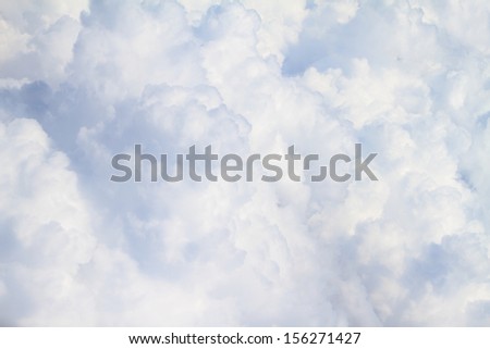White fluffy clouds full size close up background