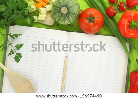 Blank recipe book with vegetables