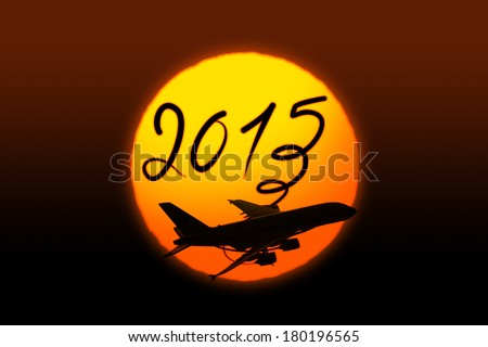 New year 2015 drawing by airplane in front of the sun