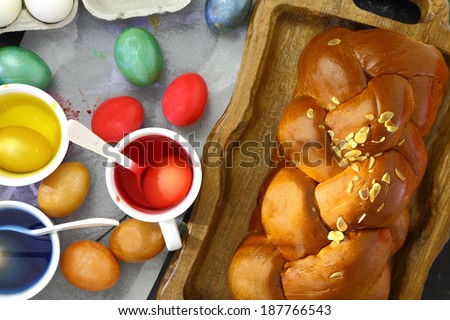 Easter sweet brioche, colored eggs and liquid dye