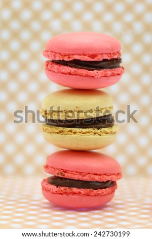 Traditional french colorful macaroons on retro background