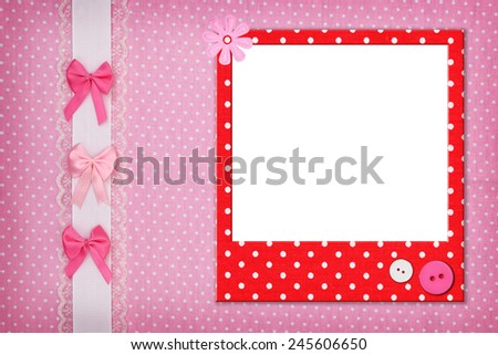 Photo frame on pink polka dot background
