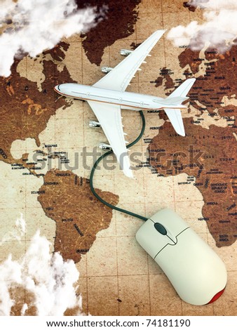 Airplane on world map connected to a computer mouse