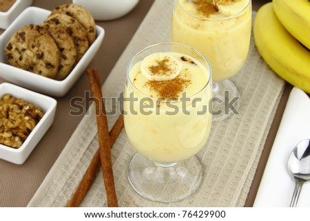 Glass with sweet banana pudding dessert