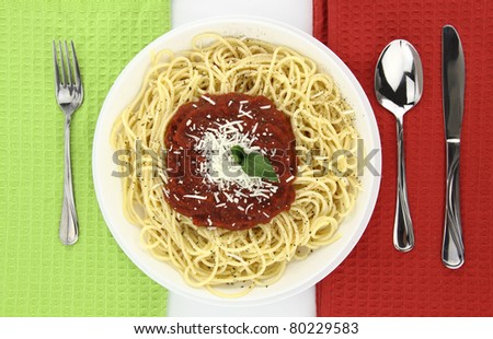 Spaghetti over Italian flag colors background