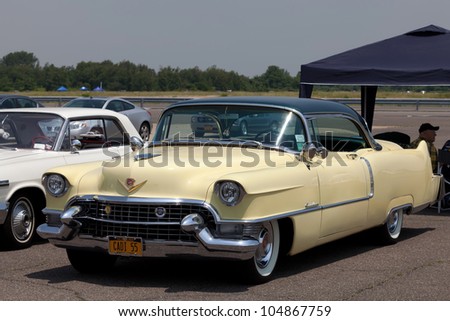 BROOKLYN, NEW YORK - JUNE 10: The 1955 Cadillac Coupe De Ville at the Antique Automobile Association of Brooklyn Annual Show on June 10, 2012 at the Floyd Bennett Field in Brooklyn, New York, USA.