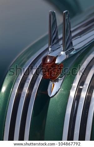 BROOKLYN, NEW YORK - JUNE 10: Closeup of the hood ornament of the 1953 Pontiac Chieftain at the Antique Automobile Association of Brooklyn Annual Show on June 10, 2012 in Brooklyn, New York, USA.