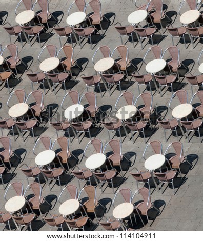 Empty tables of the Venetian cafe on the San Marco square