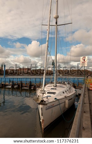 BROOKLYN, NEW YORK - OCTOBER 30: The damaged yacht in the aftermath of the Superstorm Sandy on October 30, 2012 in the Sheepshead Bay, Brooklyn, New York, USA.
