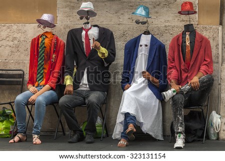 ROME, ITALY - AUGUST 1 2015: The Invisible Men street performers are gaining popularity on the streets of Rome, Italy.