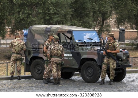 ROME, ITALY - JULY 30 2015: Soldiers of the \'Operation Safe Streets\', a police operation launched by the Italy\'s government to use the Italian armed forces in the fight against crime.