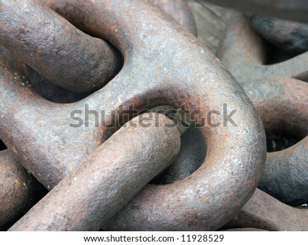 Fragment of an old rusted iron anchor chain in the New York Seaport museum