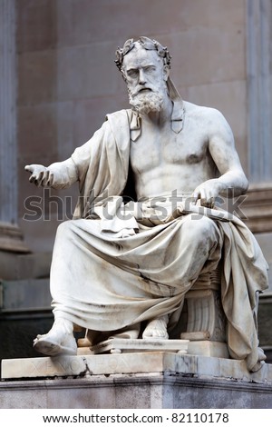Statue of a philosopher in the ancient Greek style, situated in front of the building of Austrian Parliament.