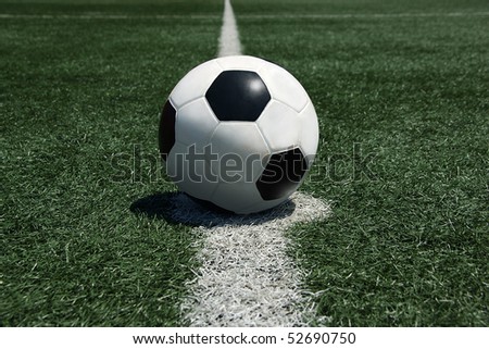 Soccer ball on center line of turf