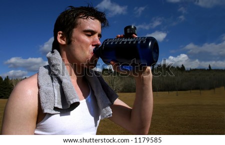 Runner taking a drink of water