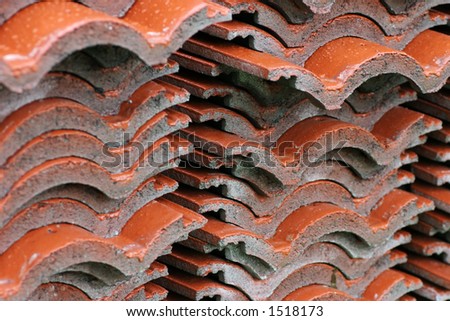 Layers of roof tiles