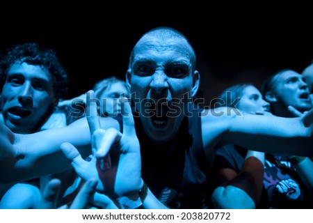 Budapest, Hungary - August 10th 2010: Crowd in the front row at Sziget Festival during Iron Maiden concert