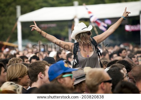 Budapest, Hungary - August 12th 2010: A young adult female in the crowd during a concert at Sziget Festival