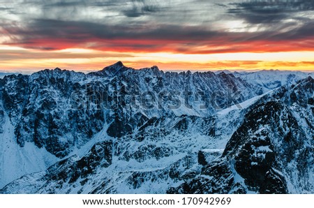 Winter mountain panorama landscape at fire sunset, Slovakia - High Tatras - Rysy