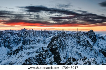Winter mountain panorama landscape at fire sunset, Slovakia - High Tatras - Rysy