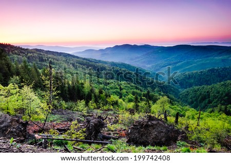Colorful pink sunrise skies over beautiful mountain valley in Volovske mountains in Eastern Slovakia
