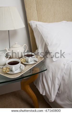 Bed and Breakfast. Cozy hotel room and breakfast Tray