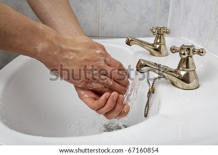 Washing Hands. Man washing his hands