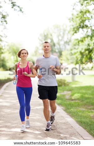 Couple jogging in the park
