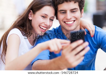 Young People With Mobile Phone