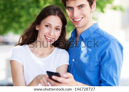 Young people with mobile phone
