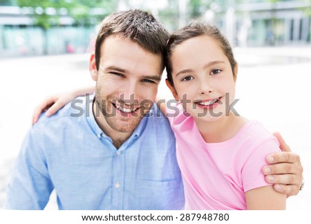 Father and daughter hugging